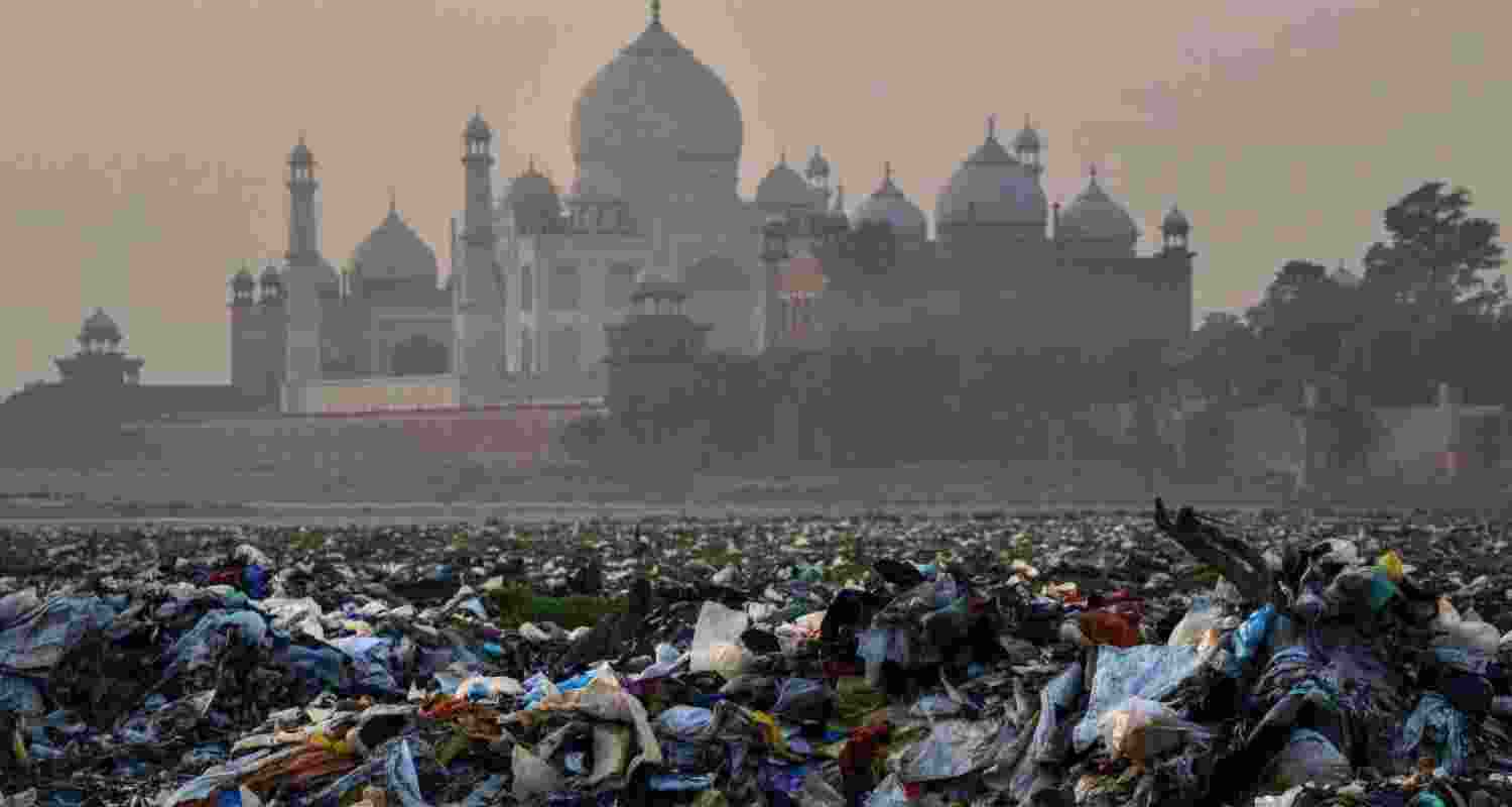 Piles of trash accumulated in the polluted Yamuna waters near the iconic Taj Mahal in Agra, Uttar Pradesh.