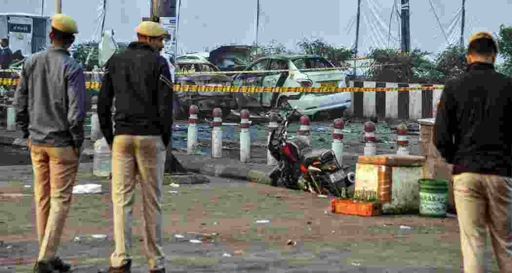 Police personnel at the site of Delhi blast.