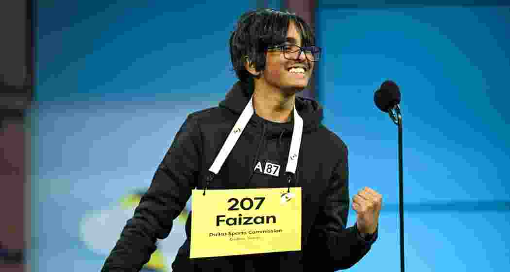 Faizan Zaki reacts on stage after winning the 2025 Scripps National Spelling Bee, held in Maryland, US by correctly spelling “éclaircissement” in the final round of the centenary edition.