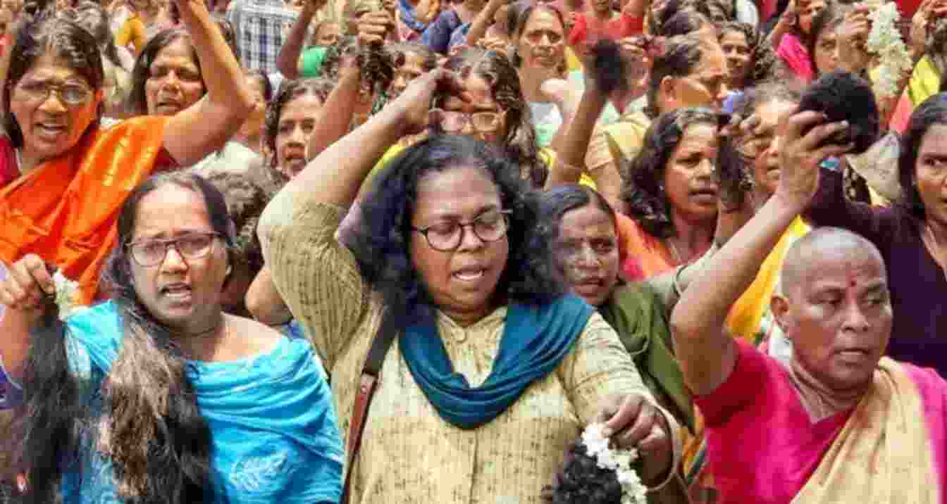 ASHA workers cut their hair during a protest, demanding an increase in their honorarium, in Thiruvananthapuram - file image. ASHA workers cut their hair during a protest, demanding an increase in their honorarium, in Thiruvananthapuram - file image.