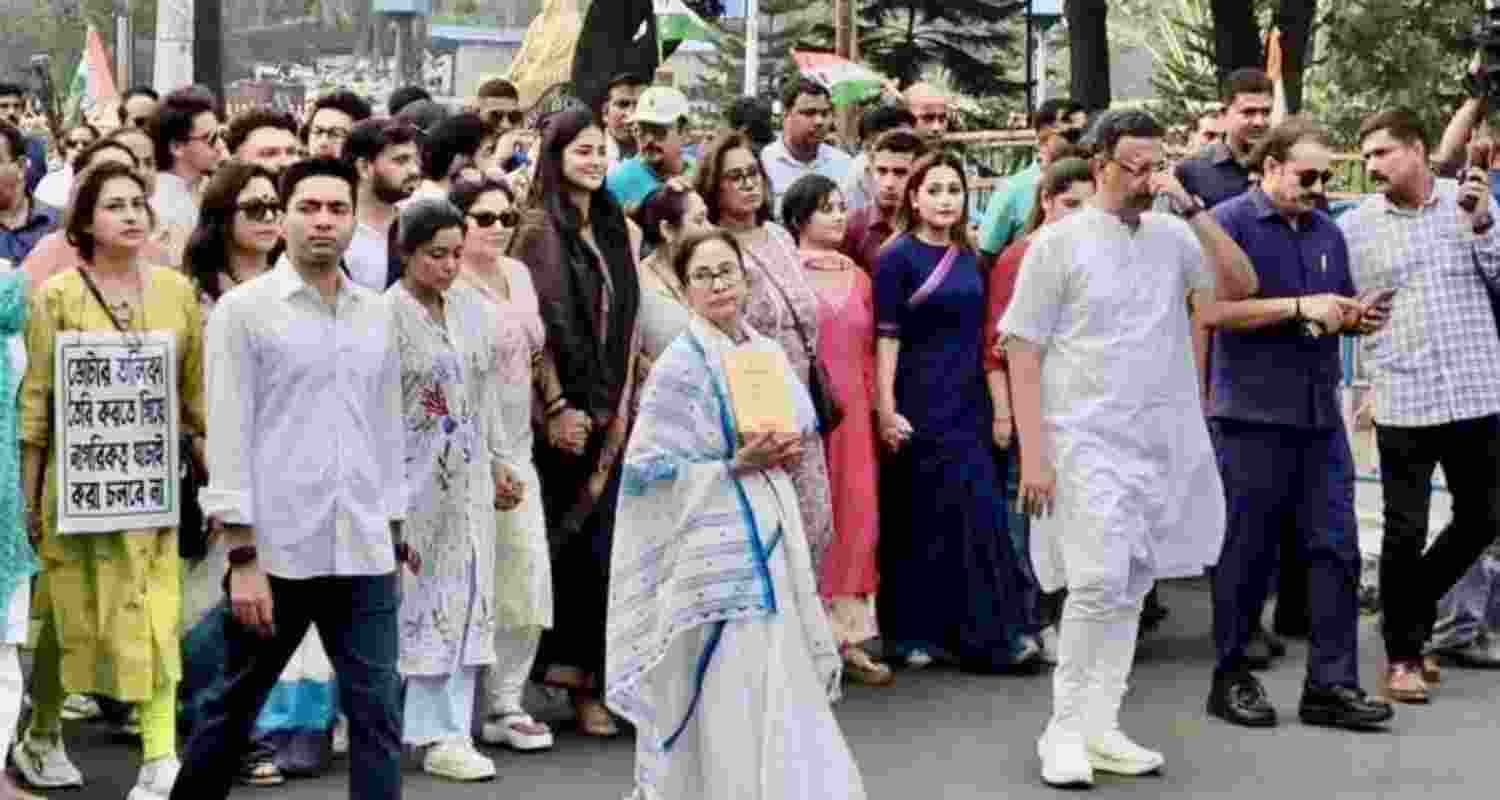 Chief Minister Mamata Banerjee, party national general secretary Abhishek Banerjee and Trinamool Congress leaders and supporters march to protest against SIR in West Bengal.