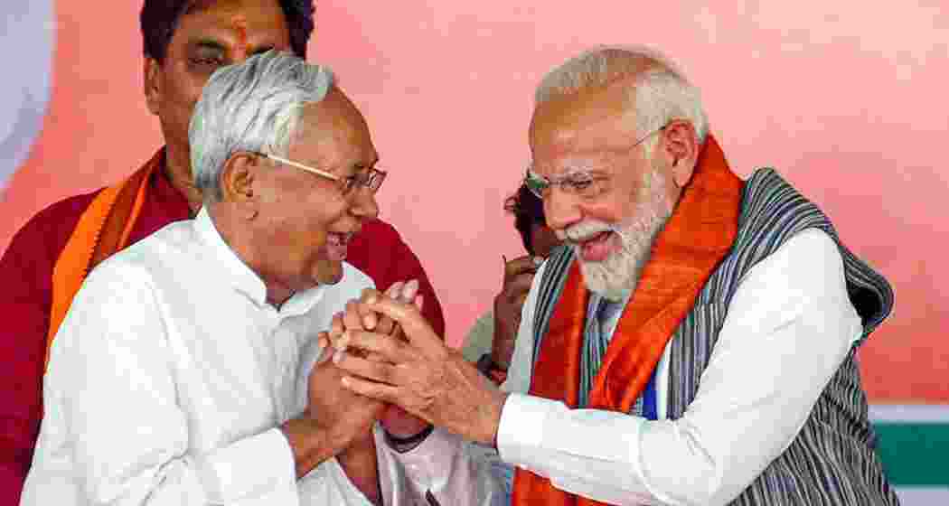 File photo of Bihar CM Nitish Kumar with Prime Minister Narendra Modi during an election rally in Bihar. 