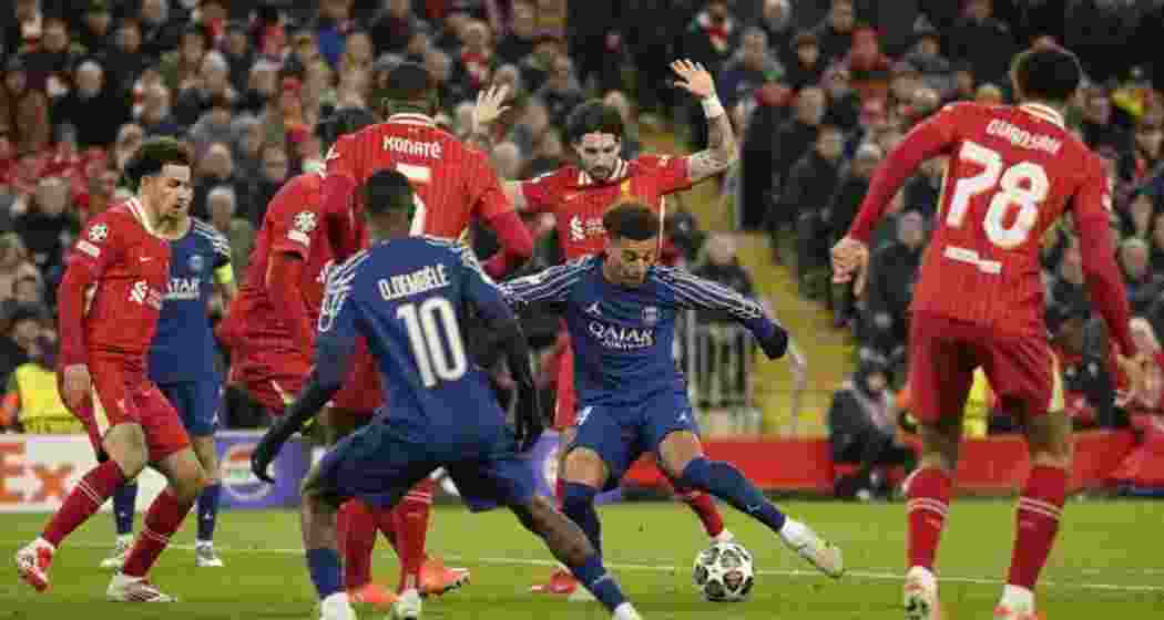 PSG's Desire Doue takes a shot during the Champions League Round of 16 second-leg match against Liverpool at Anfield, Liverpool, England, on Tuesday, March 11, 2025.







