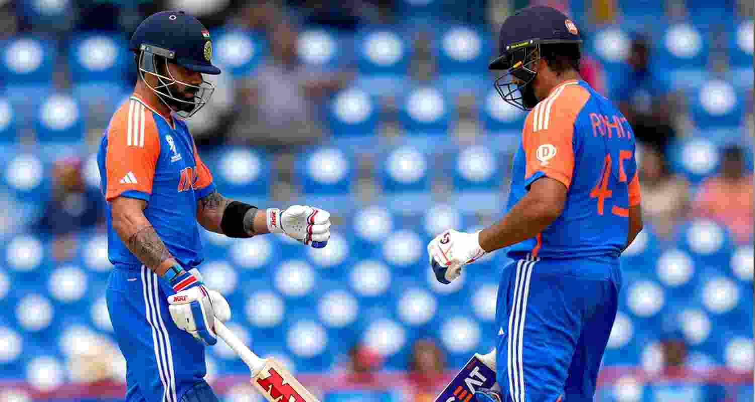 Indian batters Virat Kohli (L), Rohit Sharma (R).