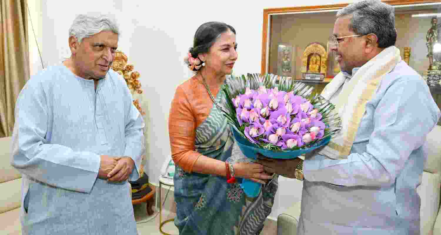 Veteran film actor Shabana Azmi being honoured with a Lifetime Achievement Award in a ceremony hosted by Karnataka Chief Minister Siddaramaiah on Monday. Azmi's husband Javed Akhtar accompanied her on the occasion. Image: X