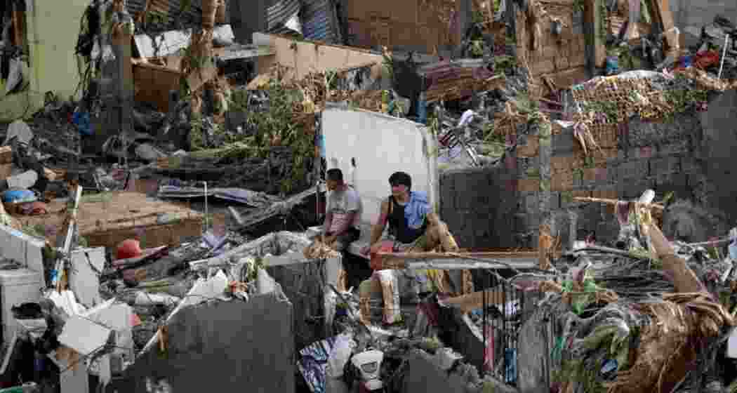 Super typhoon hits Philippines: 2 dead, 1 million evacuated Super typhoon hits Philippines: 2 dead, 1 million evacuated