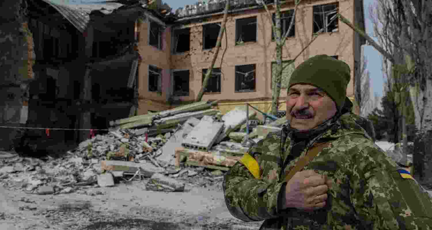 Ukraine pulls back from fortified positions amid Russian assault.