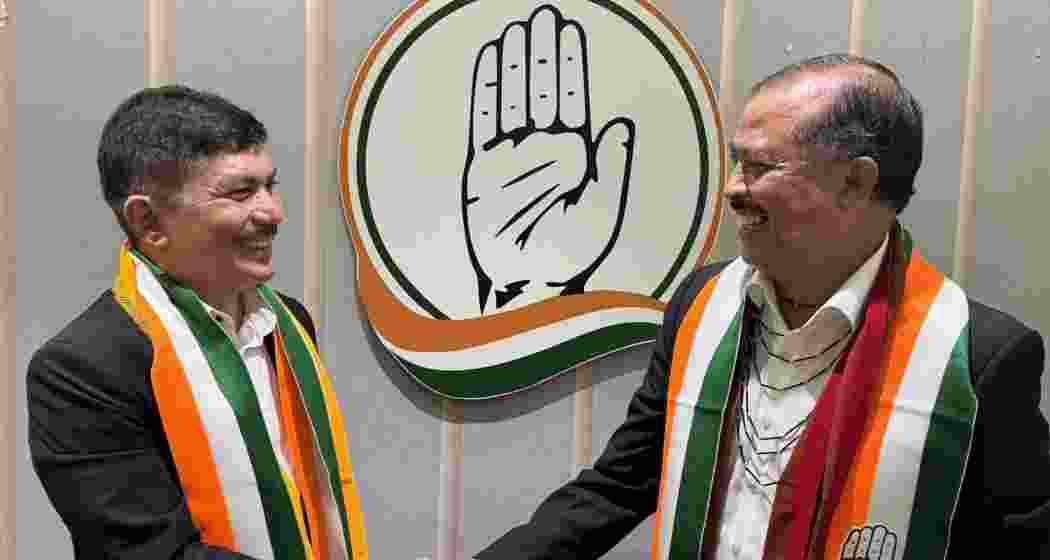 Meghalaya Congress president Vincent Pala shares a handshake with Zenith Sangma, marking the latter’s return to the party.