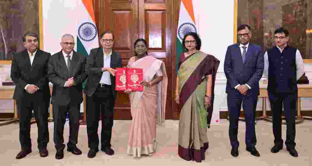 Members of the 16th Finance Commission handing over the report to President Droupadi Murmu at Rashtrapati Bhavan. (Image: PTI) Members of the 16th Finance Commission handing over the report to President Droupadi Murmu at Rashtrapati Bhavan. (Image: PTI)