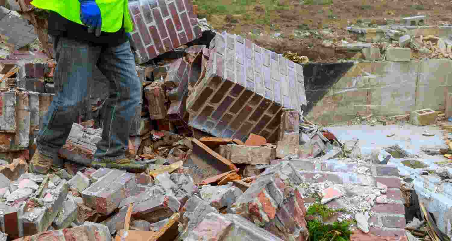 Missile debris in Abu Dhabi injures 12, including 5 Indians, amid West Asia conflict; authorities report minor to serious injuries, India yet to confirm.