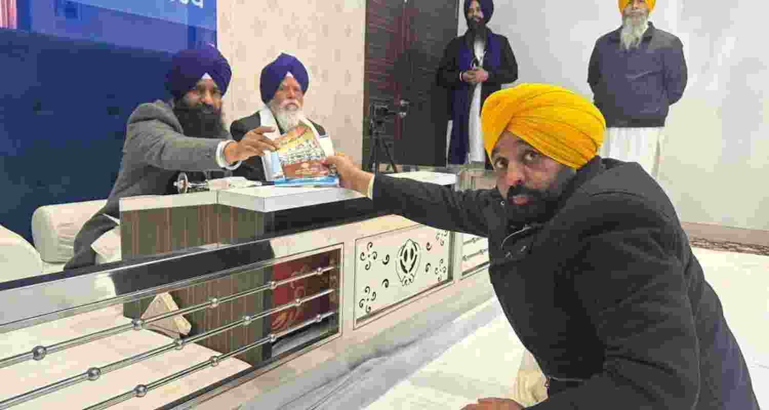 Akal Takht acting Jathedar Giani Kuldeep Singh Gargaj and Jathedar Giani Tek Singh of Takht Sri Damdama Sahib presenting Punjab Chief Minister Bhagwant Mann with a copy of the monthly Gurdwara Gazette and Sikh Code of Conduct in Amritsar on Thursday.
