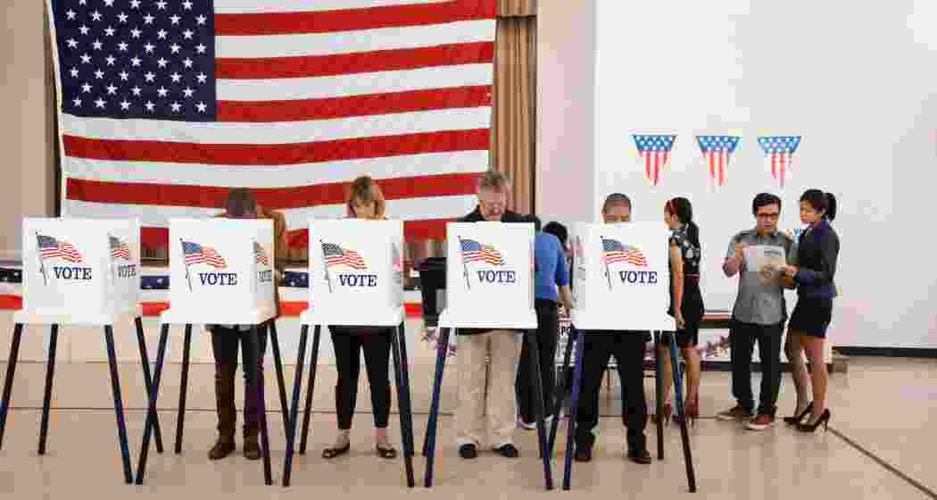 American voters cast ballots in a historic election, with democracy, economy, and abortion emerging as top issues, as shown in recent exit polls.