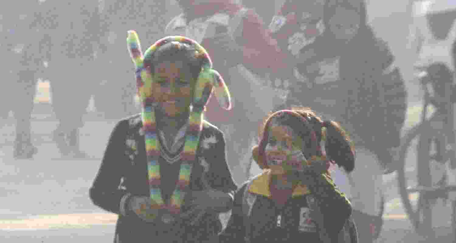 Students make their way amid dust and smog as air quality deteriorates, in Gurugram. Students make their way amid dust and smog as air quality deteriorates, in Gurugram.