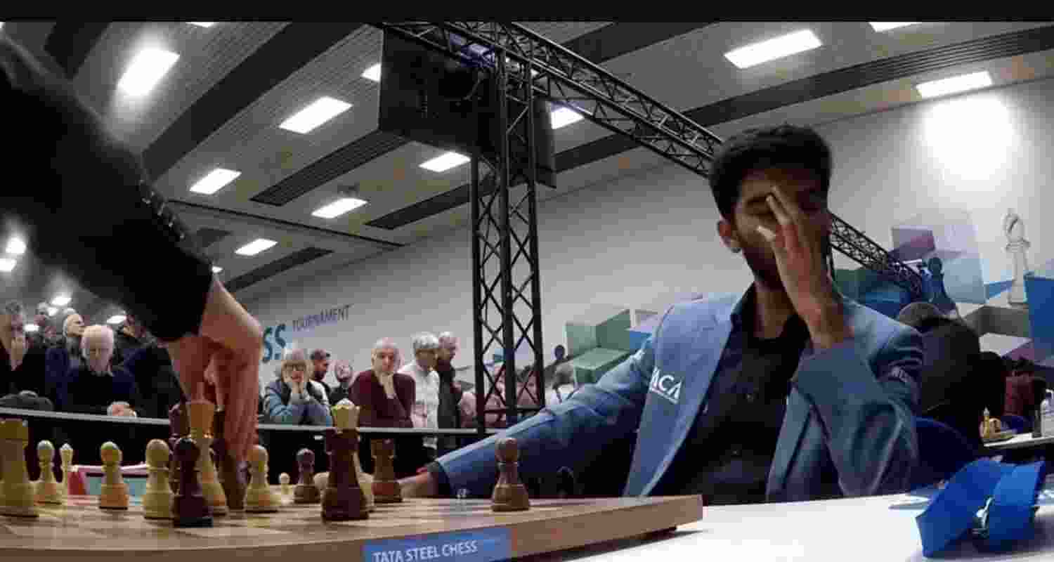 Grandmaster D Gukesh reacts after falling into a blind spot and making an unimaginable blunder in his Round 6 match against  Nodirbek Abdusatorov.