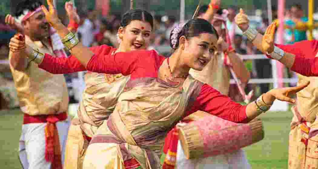 Women and men celebrate the Assamese New Year with traditional Rongali Bihu dance performances across villages and towns in Assam. (Representative image)