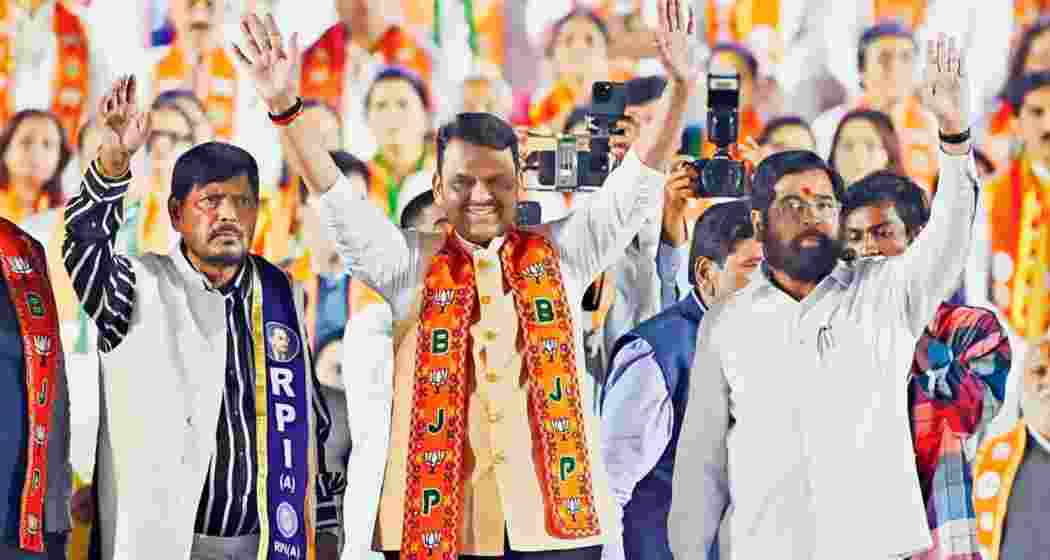 (From left) Union Minister of State and RPI (A) chief Ramdas Athawale, CM Devendra Fadnavis, and DCM Eknath Shinde address a Mahayuti rally at Shivaji Park on Monday. 