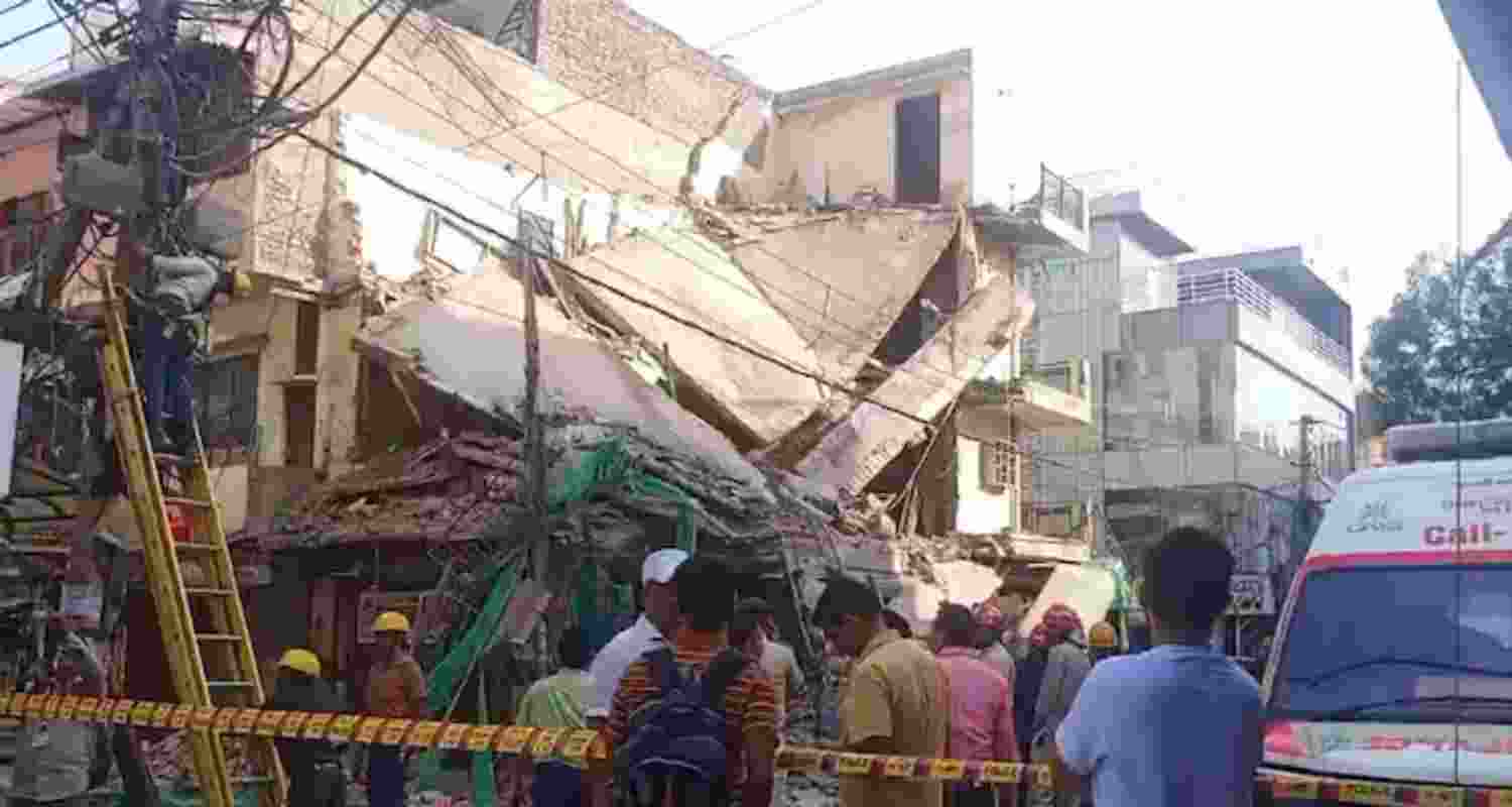 A view of the three-storey building collapsed in Rohini, Delhi. 