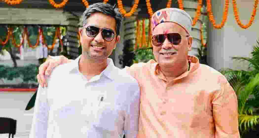 Former Chhattisgarh Chief Minister Bhupesh Baghel with his son Chaitanya Baghel, whose assets worth ₹61.20 crore have been attached by the Enforcement Directorate in the state’s liquor scam case.