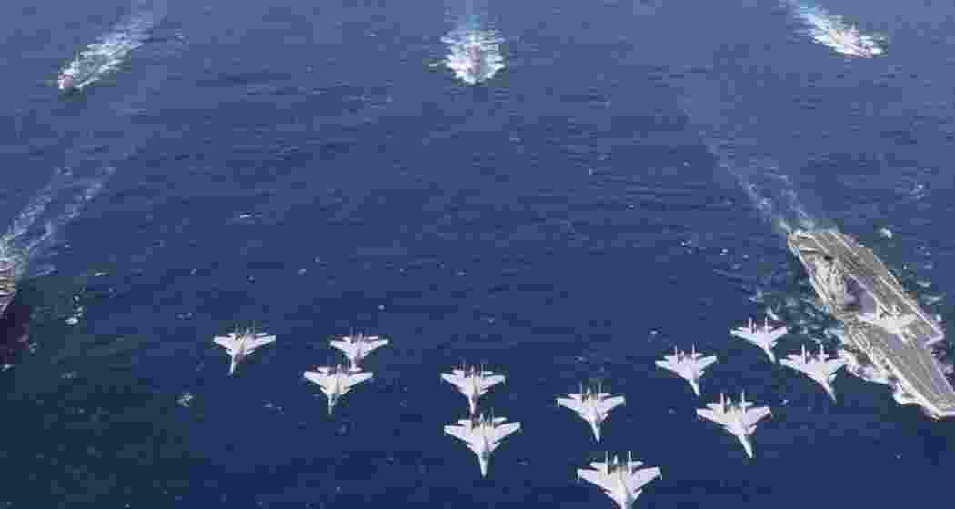 A fleet of Chinese aircraft, carriers, and naval vessels conducts military drills near Taiwan, escalating regional tensions amid Beijing's show of force. (Representational image)