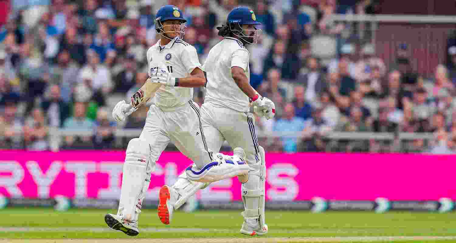 India's KL Rahul and Yashasvi Jaiswal run between the wickets on day one of the fourth test cricket match between India and England, at the Old Trafford Cricket Ground, in Manchester, on Wednesday.