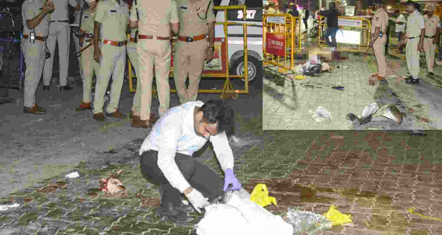 A police official investigates the site after a blast outside the Amba Vilas Palace, in Mysuru, Karnataka, Thursday. 