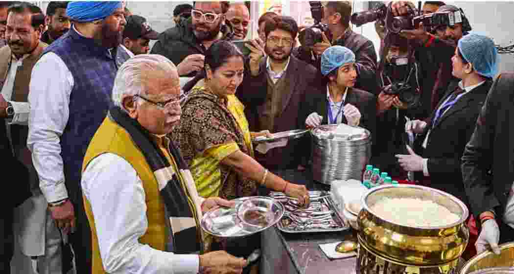 Union Minister of Housing and Urban Affairs Manohar Lal, Delhi Chief Minister Rekha Gupta and minister Ashish Sood during the inauguration of an 'Atal Canteen' to commemorate the birth anniversary of former prime minister Atal Bihari Vajpayee, in New Delhi on Dec. 25, 2025.