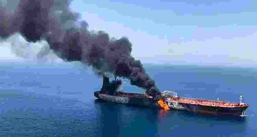 An oil tanker carrying 21  personnel was attacked by an unmanned drone near Oman.