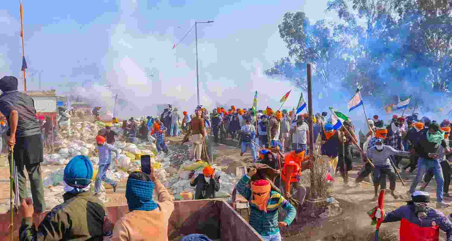 Protestors facing off against security personnel in Khanauri