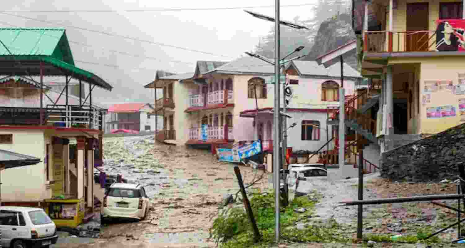 Houses partially submerged due to flash floods triggered by a cloudburst in Dharali of Uttarakhand's Uttarkashi district. 