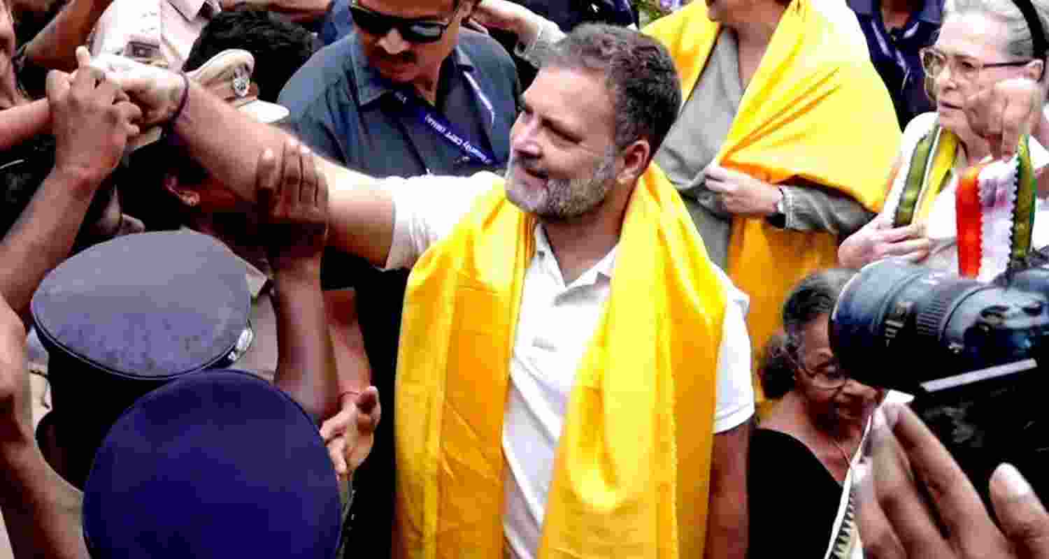 Lok Sabha LoP Rahul Gandhi greets people during his visit to the Sree Narayana Guru Samadhi programme at the SNDP Yogam Kalpetta Union hall, in Wayanad on September 22. Congress leader Sonia Gandhi also accompanied him.