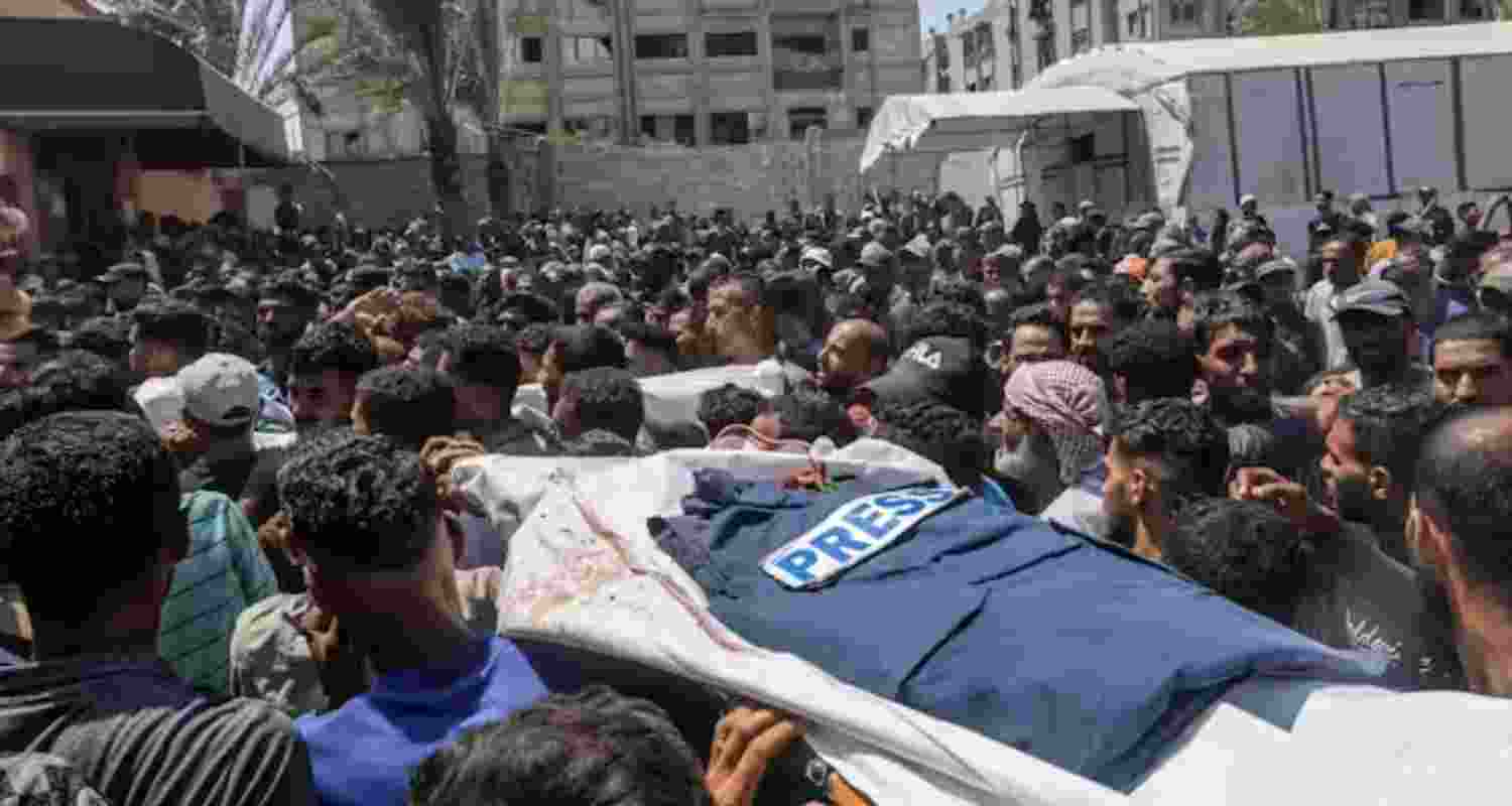 A funeral ceremony takes place in the courtyard of Nasser Hospital in Gaza following the deaths of five journalists on August 25, 2025.