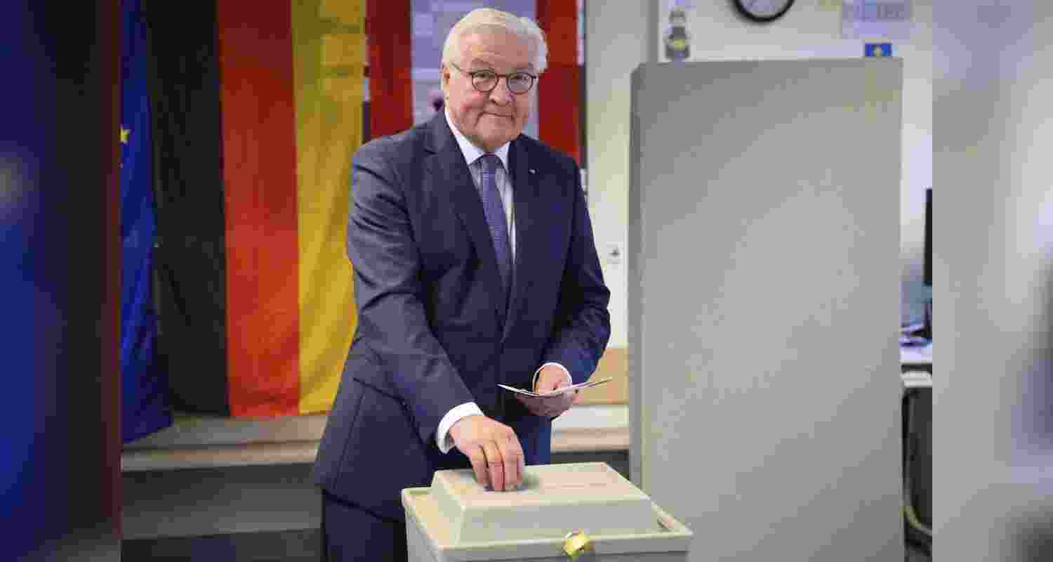 German President Frank-Walter Steinmeier casts his vote at a polling station in Berlin, Germany, Sunday.