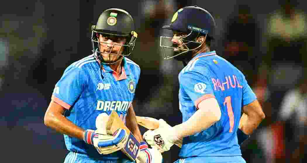 Gill and Rahul run between the wickets during an international ODI match.