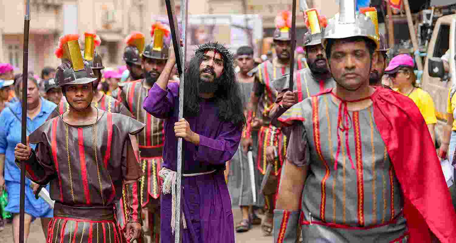 Christian devotees participate in a crucifixion procession on the Good Friday, in Mumbai on Friday