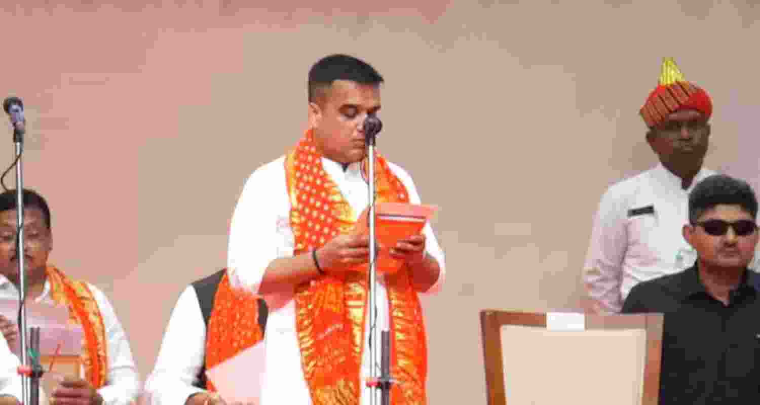 Gujarat Home Minister Harsh Sanghvi taking oath as Deputy Chief Minister.