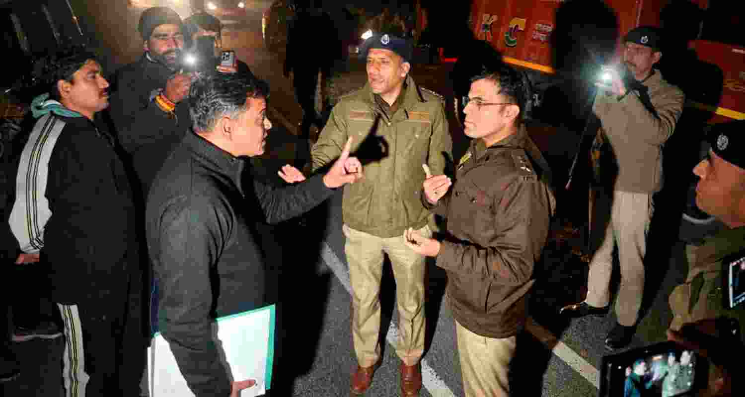 Delhi Police officials in conversation with Shimla cops.