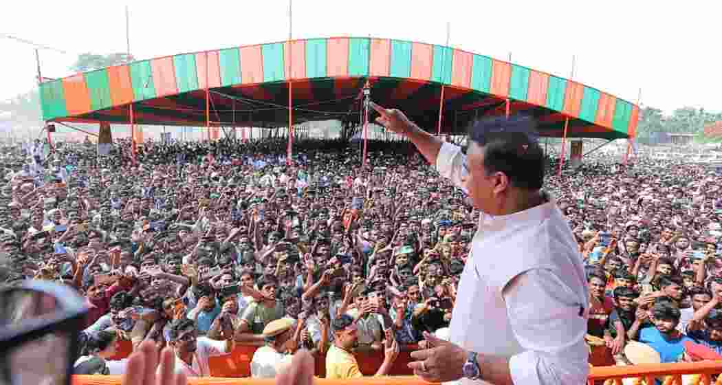 Assam CM Himanta Biswa Sarma waves to supporters during a public gathering. (File photo)