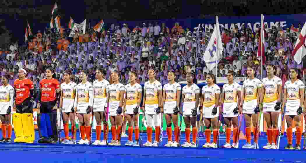 Indian women’s hockey team lines up for national anthem before a match.