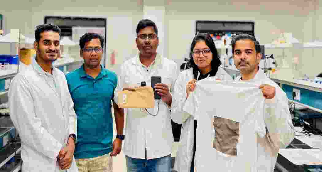 Researchers at IIT Guwahati showcase the newly developed self-cleaning heating fabric, designed to provide flexible warmth in extreme cold conditions using ultra-thin silver nanowires with a protective water-repellent coating. Researchers at IIT Guwahati showcase the newly developed self-cleaning heating fabric, designed to provide flexible warmth in extreme cold conditions using ultra-thin silver nanowires with a protective water-repellent coating.