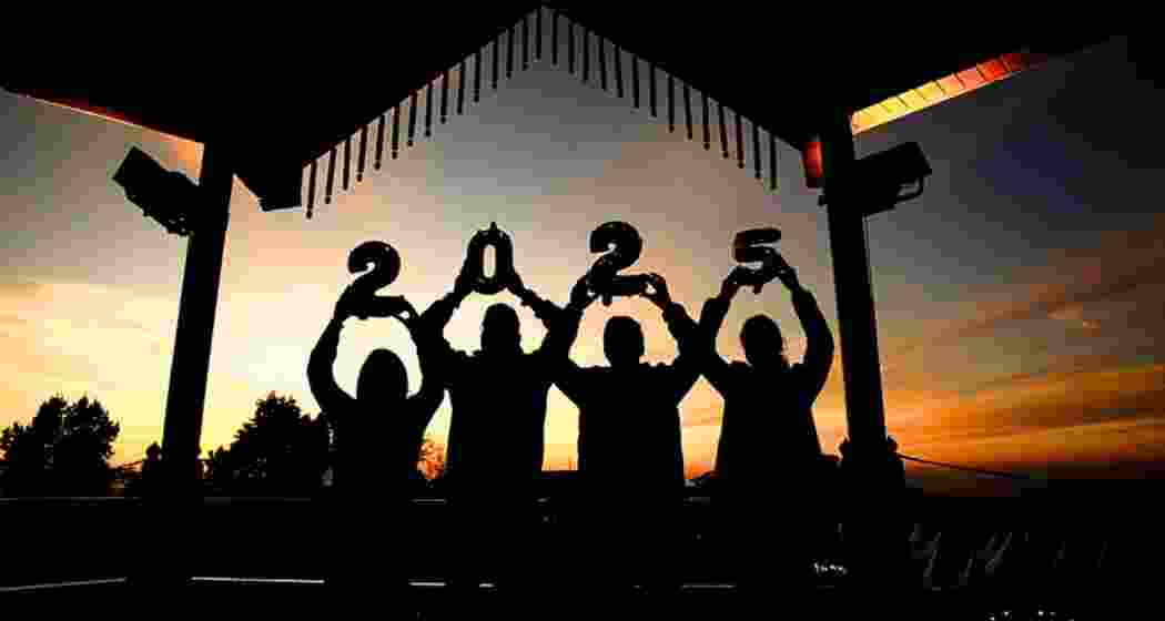 People celebrate on the eve of the new year 2025, in Shimla, Himachal Pradesh, Tuesday, Dec. 31, 2024.