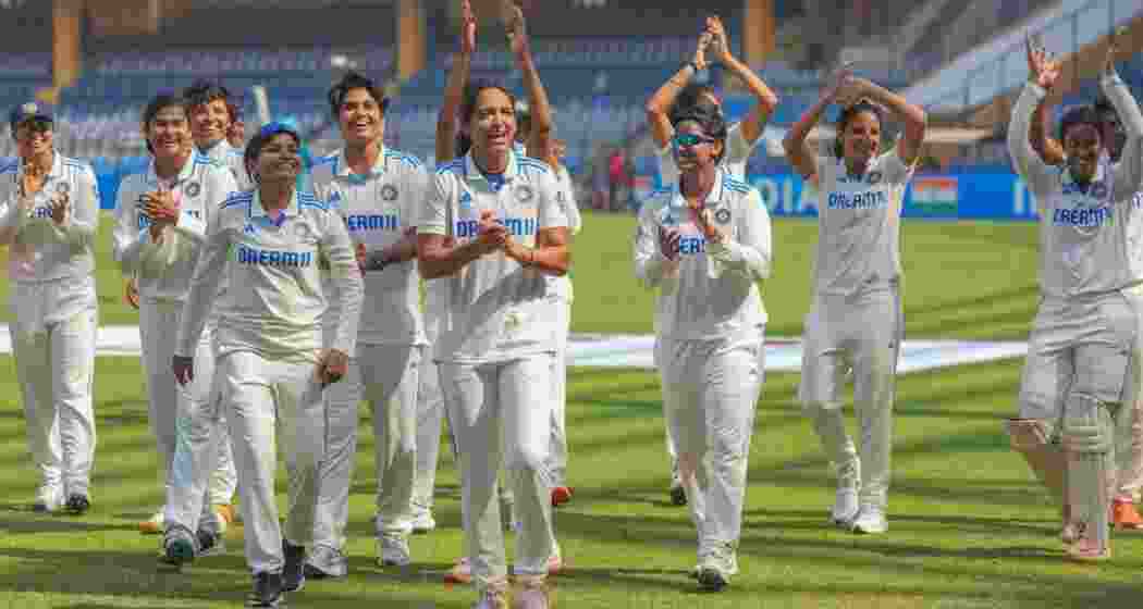 Skipper Harmanpreet Kaur with India Women's teammates. 