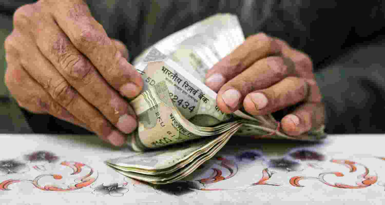 Rupee may fall to 97 vs dollar in FY27 amid West Asia crisis, says Yes Bank report, citing high oil prices, weak capital flows, and rising inflation risks.