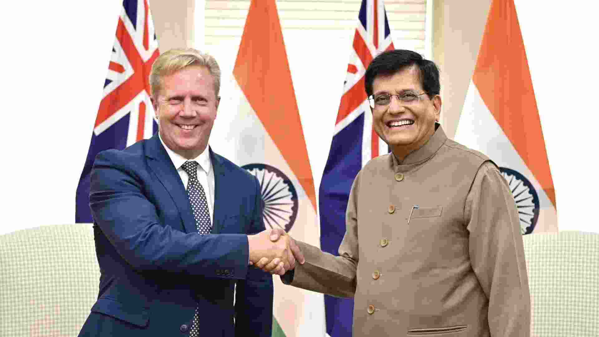 Piyush Goyal, India's Minister for Commerce and Industry, greets Todd McClay, New Zealand's Minister for Trade and Investment, on Sunday.
