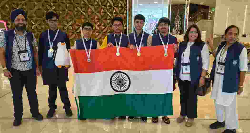 The Indian team poses following their victories.