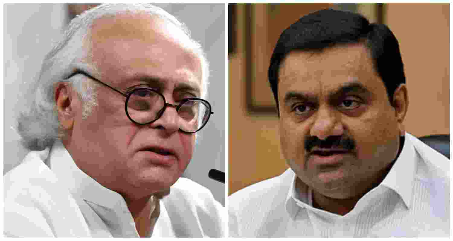 Congress general secretary for communications Jairam Ramesh (L), Indian businessman Gautam Adani (R).