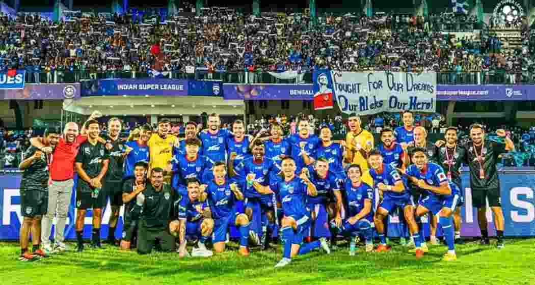 Bengaluru FC players celebrate after securing a 2-0 victory over FC Goa at the Sree Kanteerava Stadium in the first leg of their ISL 2024–25 semi-final tie. 