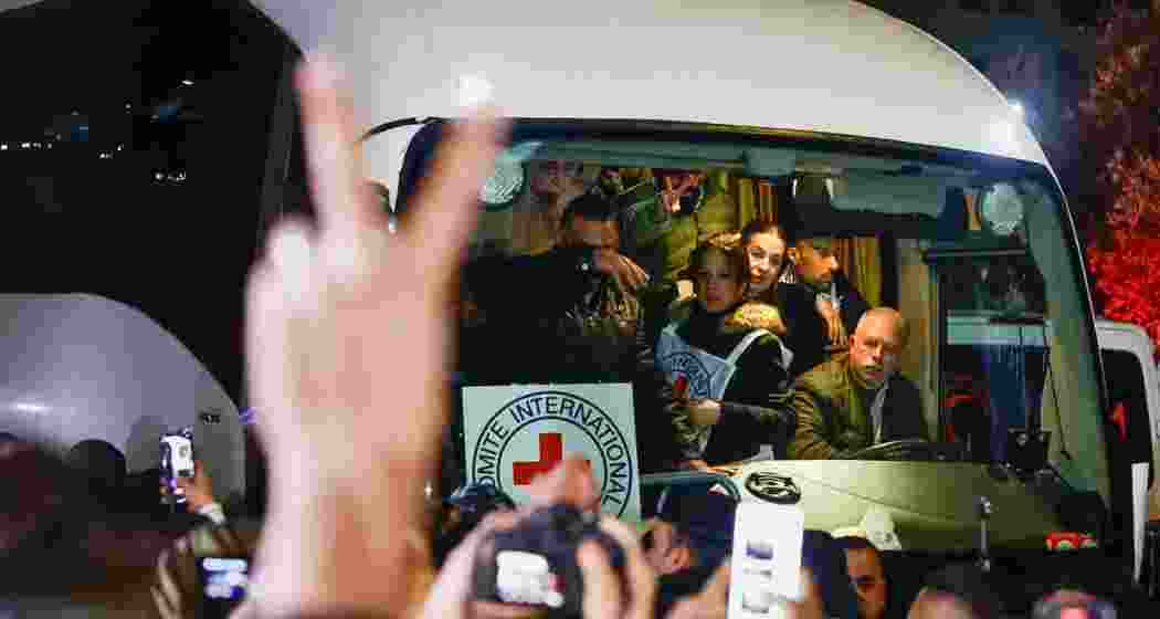 Freed Palestinian detainees arrive in Khan Younis, Gaza, as part of the latest prisoner exchange between Israel and Hamas.