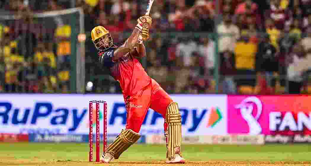 Romario Shepherd smashes a six during his explosive knock against Chennai Super Kings at the M. Chinnaswamy Stadium in Bengaluru on Saturday during an IPL 2025 league match.
