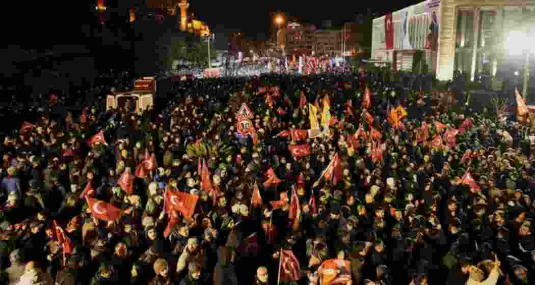 People gather outside the City Hall to protest the arrest of Istanbul Mayor Ekrem Imamoglu in Istanbul, Turkey, Wednesday, March 19, 2025.