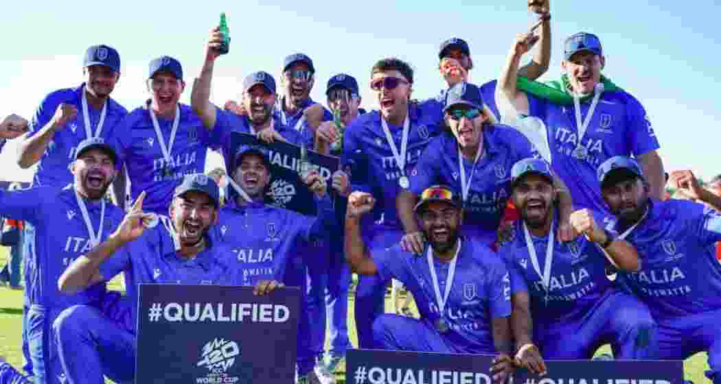 Italian players erupt in celebration after securing T20 World Cup qualification, despite defeat to Netherlands in the final group fixture in The Hague. 